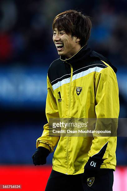 Yuki Otsu of Venlo has a laugh with team mates as he warms up prior to the Eredivisie match between Feyenoord and VVV Venlo at De Kuip on April 5,...