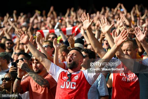 Fans of Arsenal show their support prior to the Premier League match between Arsenal FC and Manchester United at Emirates Stadium on September 03,...