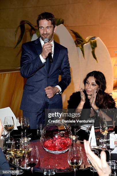 Gerard Butler and Madalina Ghenea attend a gala dinner by Antonello Colonna for the movie 'Olympus Has Fallen' on April 5, 2013 in Rome, Italy.