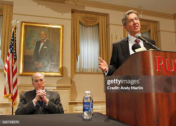 Rutgers University Board of Governors Chair Ralph Izzo addresses the media as Rutgers University President Robert L. Barchi looks on during a press...