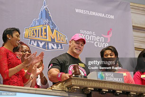 Actor John Cena rings the closing bell at the New York Stock Exchange on April 5, 2013 in New York City.