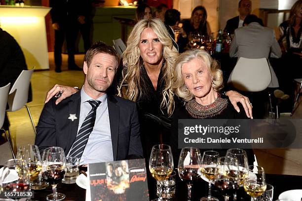 Aaron Eckhart, Tiziana Rocca and Marina Cicogna attend a gala dinner by Antonello Colonna for the movie 'Olympus Has Fallen' on April 5, 2013 in...