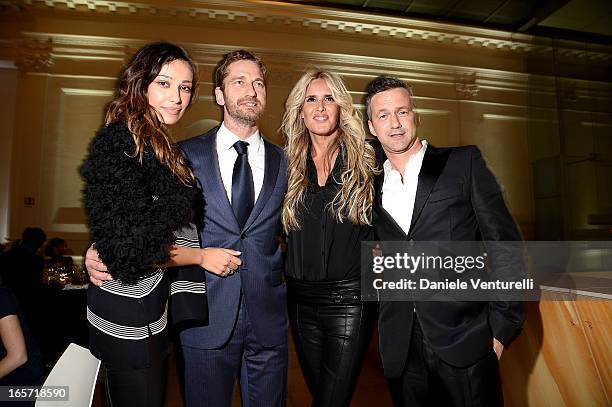 Madalina Ghenea, Gerard Butler Tiziana Rocca and Roberto Proia, CEO of Notorius attend a gala dinner by Antonello Colonna for the movie 'Olympus Has...