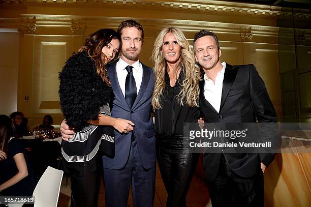 Madalina Ghenea, Gerard Butler Tiziana Rocca and Roberto Proia, CEO of Notorius attend a gala dinner by Antonello Colonna for the movie 'Olympus Has...