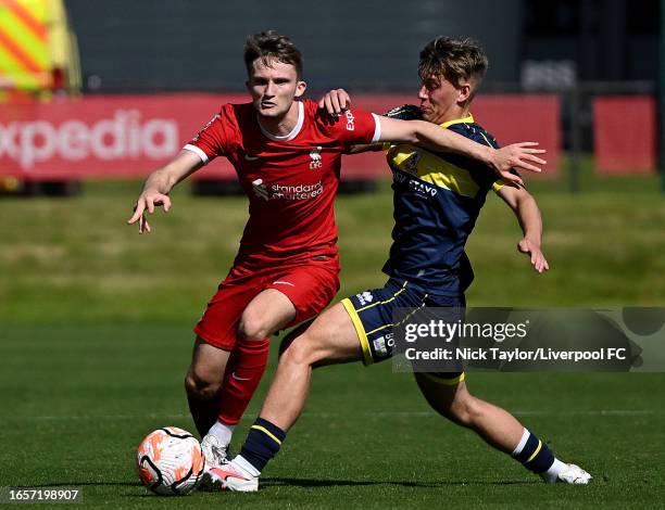 Terence Miles of Liverpool and Sonny Finch of Middlesbrough in action during the PL2 game at AXA Training Centre on September 03, 2023 in Kirkby,...