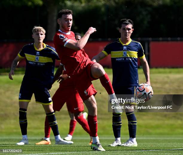 Tom Hill of Liverpool in action during the PL2 game at AXA Training Centre on September 03, 2023 in Kirkby, England.