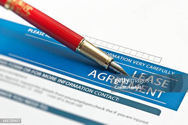 lease agreement - reading contract stock pictures, royalty-free photos & images