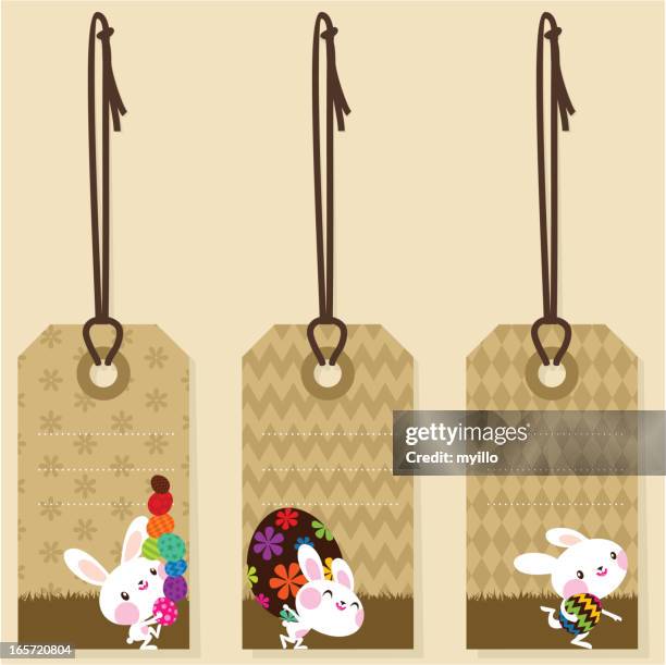 gift labels / easter egg painted and bunny - holding gift card stock illustrations