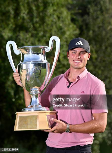 Ludvig Aberg of Sweden poses with the Omega European Masters trophy during Day Four of the Omega European Masters at Crans-sur-Sierre Golf Club on...