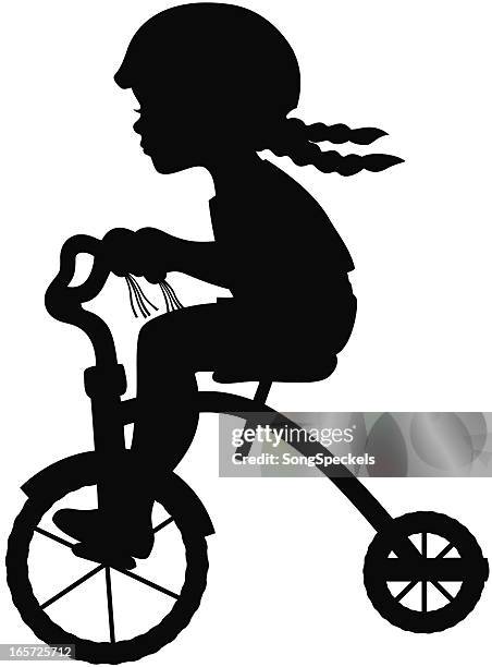 girl on tricycle silhouette - training wheels stock illustrations