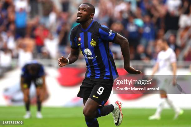 Marcus Thuram of Inter Milan celebrates after scoring the team's first goal during the Serie A TIM match between FC Internazionale and ACF Fiorentina...