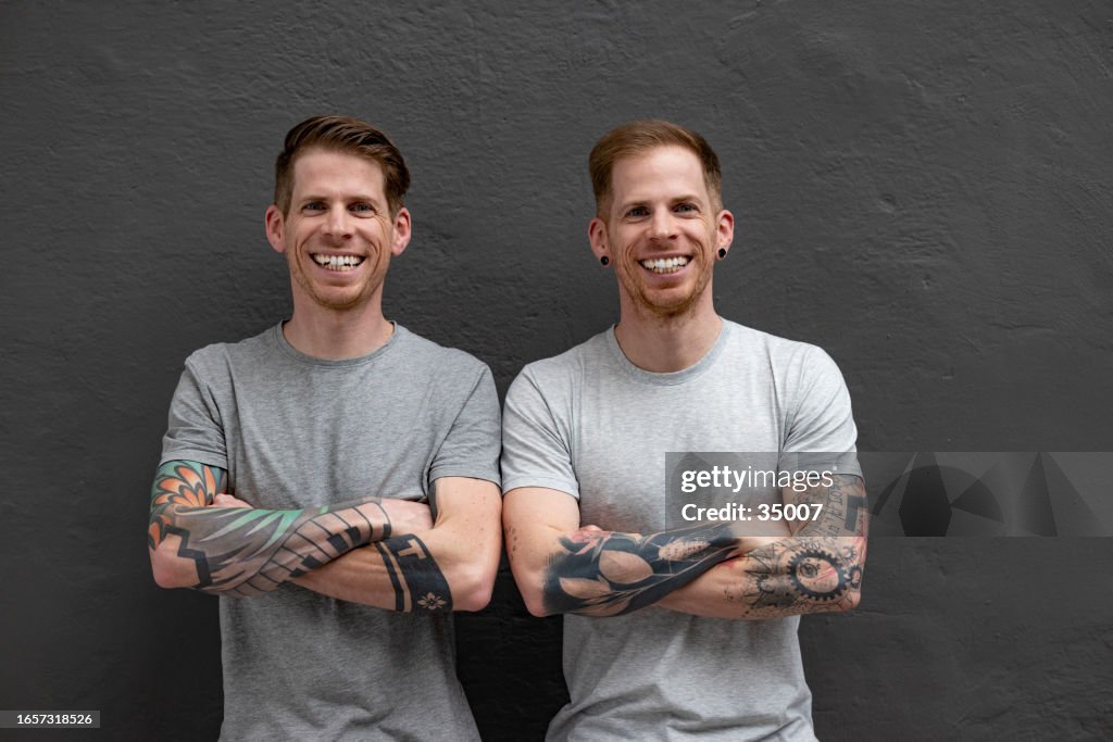 Twin brothers big smile