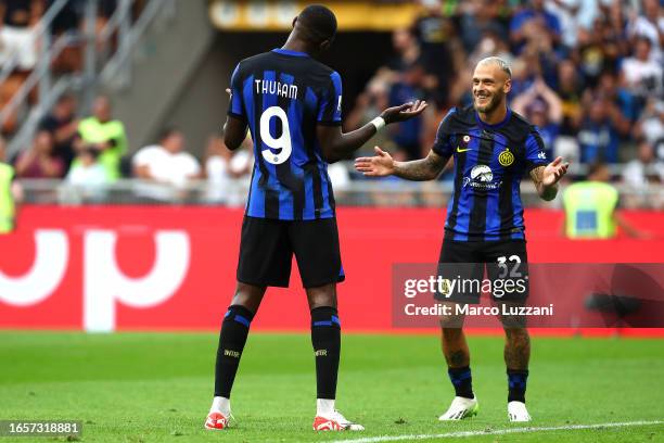 Marcus Thuram of Inter Milan celebrates after scoring the team's first goal with Federico Dimarco during the Serie A TIM match between FC...