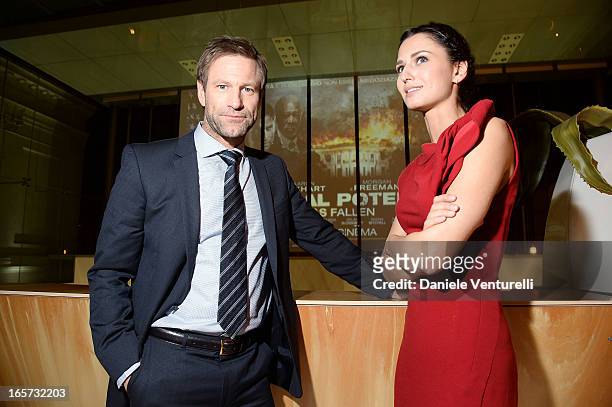 Anna Safroncik and Aaron Eckhart attend a gala dinner by Antonello Colonna for the movie 'Olympus Has Fallen' on April 5, 2013 in Rome, Italy.