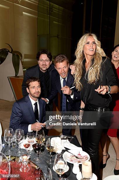 Gerard Butler, Kaspar Capparoni and Tiziana Rocca attend the gala dinner by Antonello Colonna for the movie 'Olympus Has Fallen' on April 5, 2013 in...