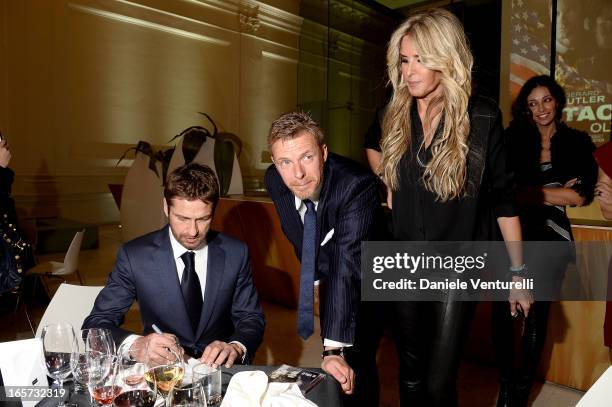 Gerard Butler, Kaspar Capparoni and Tiziana Rocca attend the gala dinner by Antonello Colonna for the movie 'Olympus Has Fallen' on April 5, 2013 in...