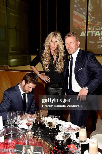 Gerard Butler, Kaspar Capparoni and Tiziana Rocca attend the gala dinner by Antonello Colonna for the movie 'Olympus Has Fallen' on April 5, 2013 in...