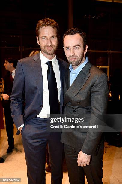 Gerard Butler and Brendan Mullane, Creative Director of Brioni attend a gala dinner by Antonello Colonna for the movie 'Olympus Has Fallen' on April...