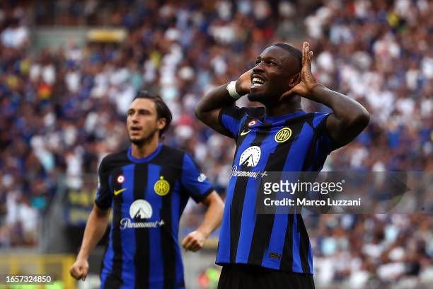 Marcus Thuram of Inter Milan celebrates after scoring the team's first goal during the Serie A TIM match between FC Internazionale and ACF Fiorentina...