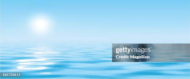 a hazy sun over bright blue water - tranquility 幅插畫檔、美工圖案、卡通及圖標