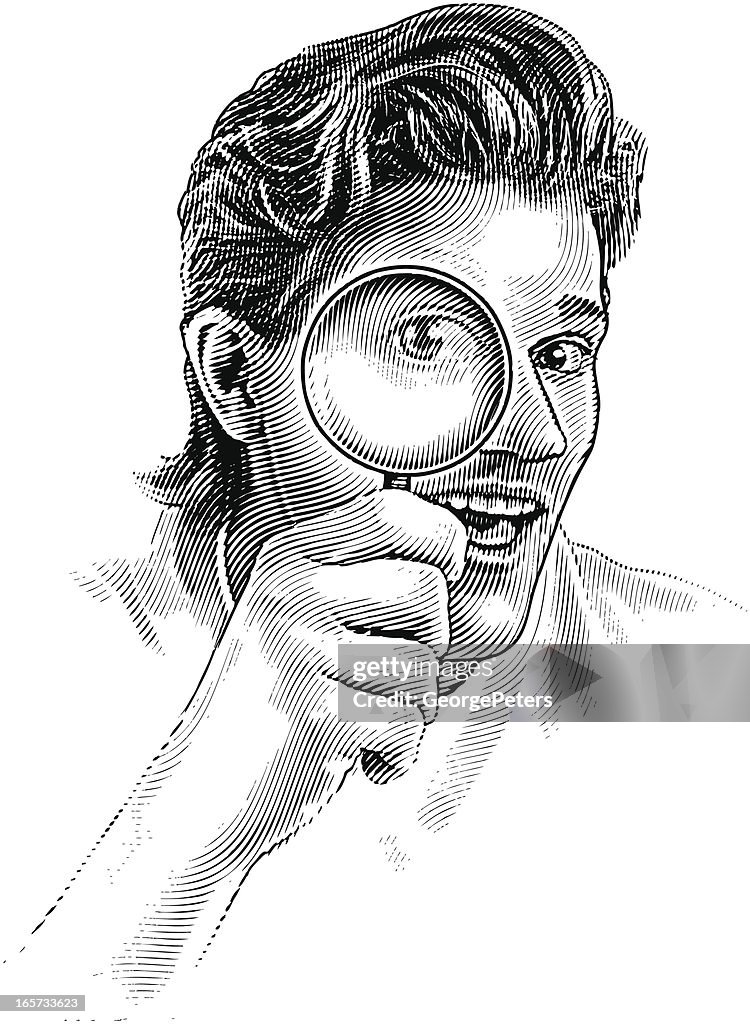 Man Holding Magnifying Glass
