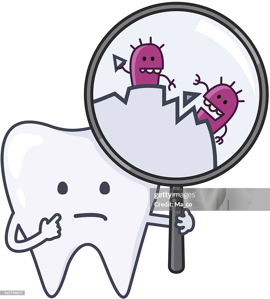 "Auch" Dente com as cavidades
