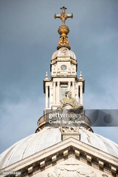 statue of saint paul on st. paul’s cathedral facade - cupola stock pictures, royalty-free photos & images