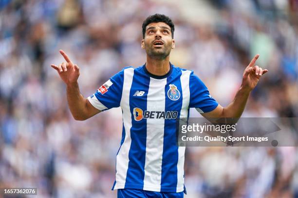 Mehdi Taremi of FC Porto celebrates after scoring his team's first goal but his goal is disallowed after a VAR check during the Liga Portugal Betclic...