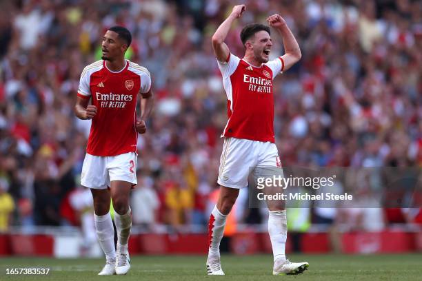 Declan Rice of Arsenal celebrate their side's third goal scored by Gabriel Jesus of Arsenal during the Premier League match between Arsenal FC and...