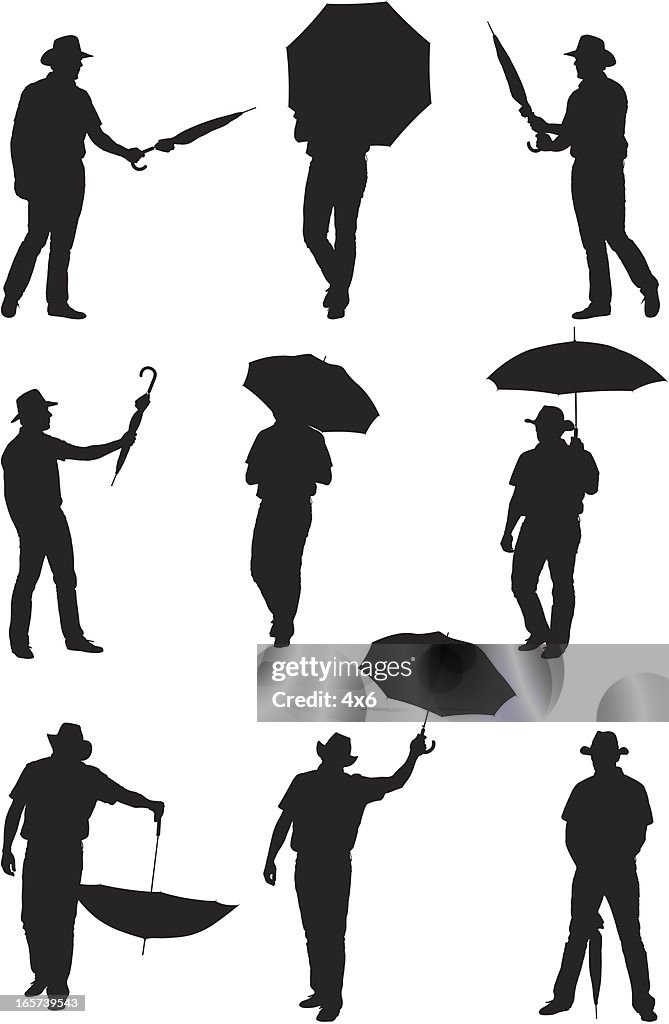 Men posing with umbrellas