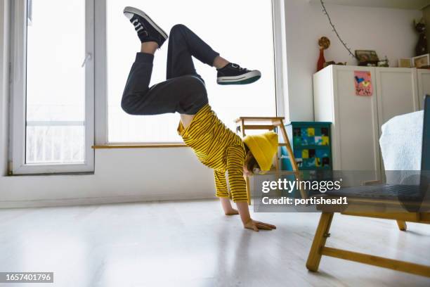 happy little boy during an online breakdancing class - bulgaria dance stock pictures, royalty-free photos & images