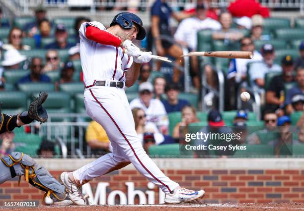 Matt Olson of the Atlanta Braves breaks hits bat as he hits an RBI groundout in the bottom of the sixth inning against the Pittsburgh Pirates at...