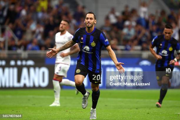 Hakan Calhanoglu of Inter Milan celebrates after scoring the team's third goal during the Serie A TIM match between FC Internazionale and ACF...