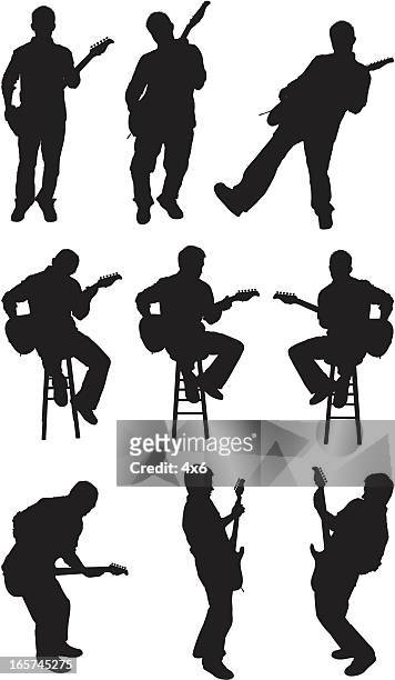 male guitarist performing and rocking out - guitarist stock illustrations