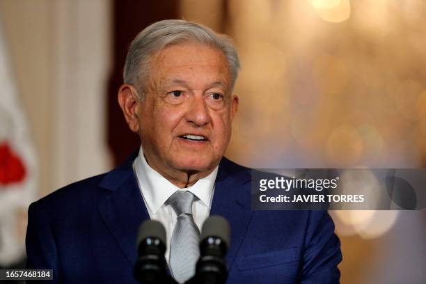 Mexican President Andres Manuel Lopez Obrador speaks next to his Chilean counterpart Gabriel Boric during a joint statement following their meeting...