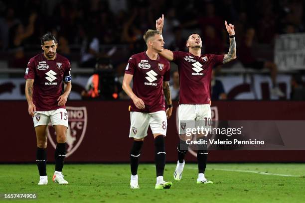 Nemanja Radonjic of Torino FC celebrates after scoring the team's first goal during the Serie A TIM match between Torino FC and Genoa CFC at Stadio...