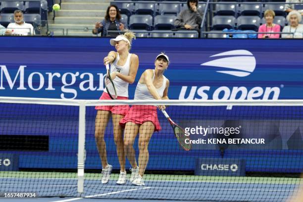 Canada's Gabriela Dabrowski and New Zealand's Erin Routliffe hit a return to Vera Zvonareva and Germany's Laura Siegemund during the US Open tennis...