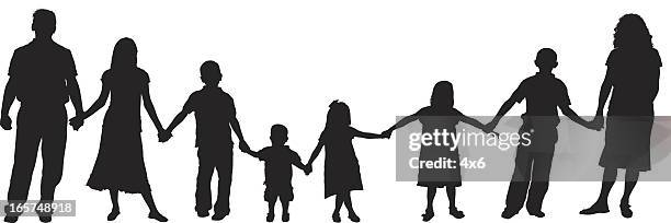 family with young kids all holding hands - sister stock illustrations