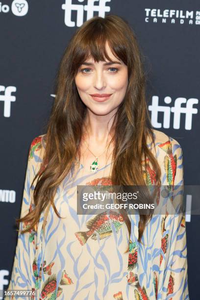 Actress Dakota Johnson arrives for the premiere of "Daddio" during the Toronto International Film Festival at the TIFF Bell Lightbox in Toronto,...