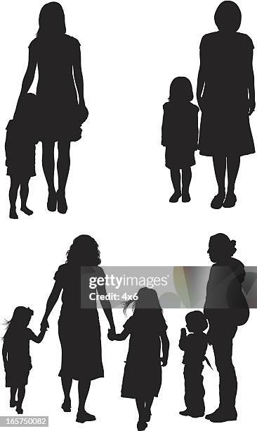 mothers with their children - black and white people holding hands stock illustrations