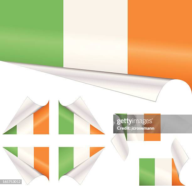 stockillustraties, clipart, cartoons en iconen met irish flags behind curled paper - orange peel