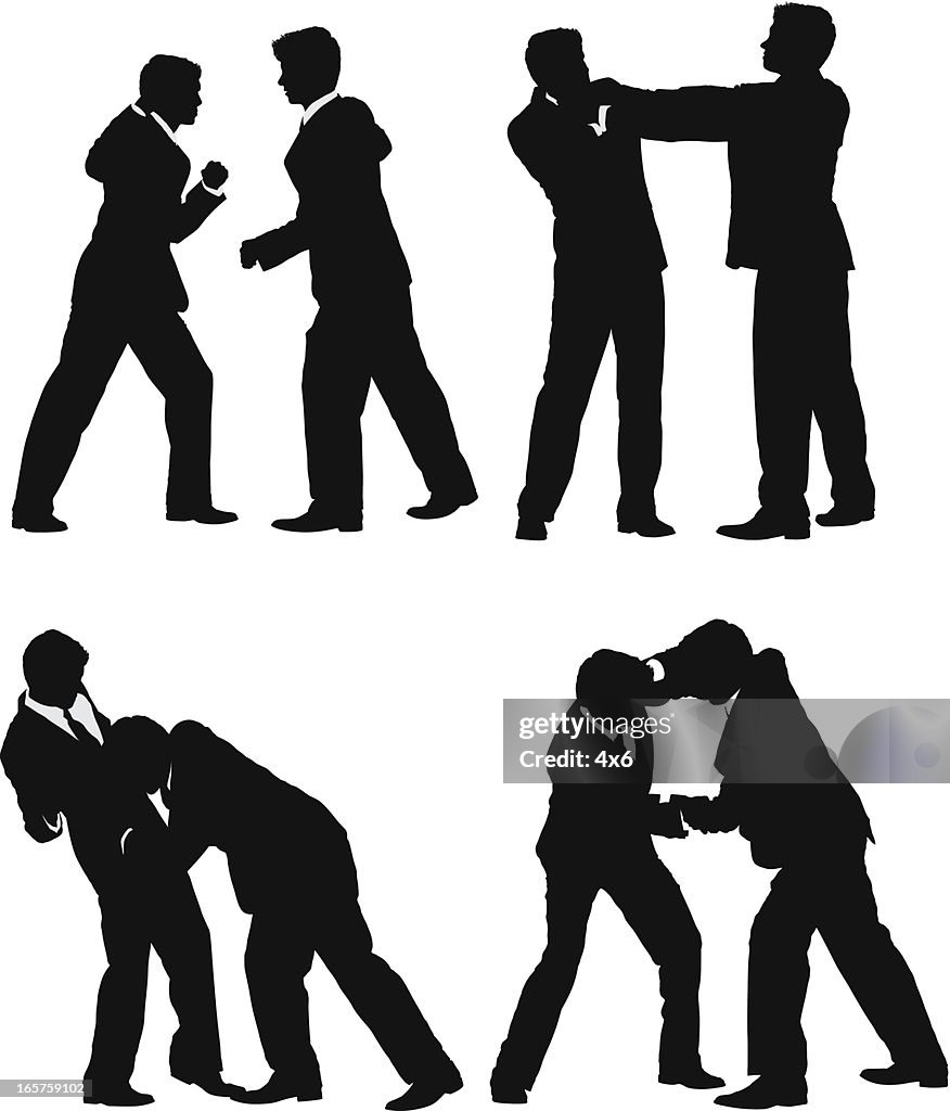 Businessmen fighting