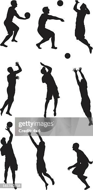 männer spielen sie beach-volleyball - spiking stock-grafiken, -clipart, -cartoons und -symbole