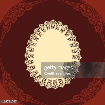 Egg doily with chocholate background Egg doily with chocholate background