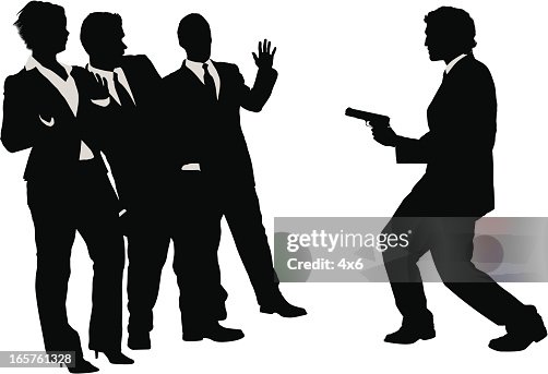 Business people being held up by man with gun Business people being held up by man with gun