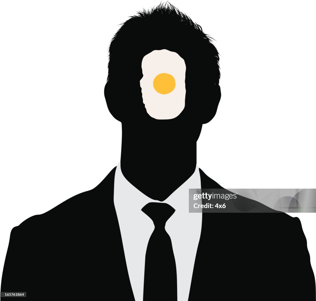 Primer plano de hombre de negocios con un huevo en su rostro