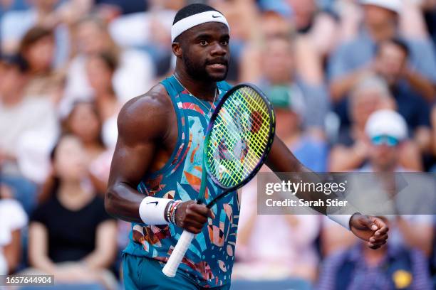 Frances Tiafoe of the United States reacts against Rinky Hijikata of Australia during their Men's Singles Fourth Round match on Day Seven of the 2023...