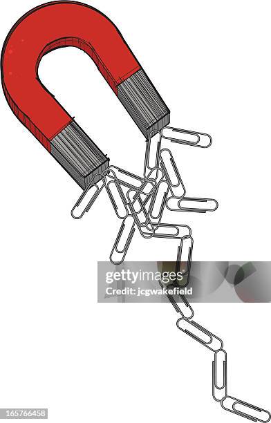 magnet picking up paperclips - paper clip stock illustrations