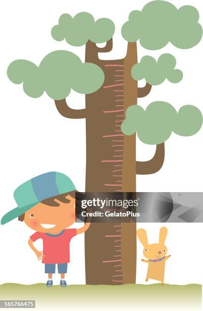 bildbanksillustrationer, clip art samt tecknat material och ikoner med young boy and pet checking their height against a tree - tree log