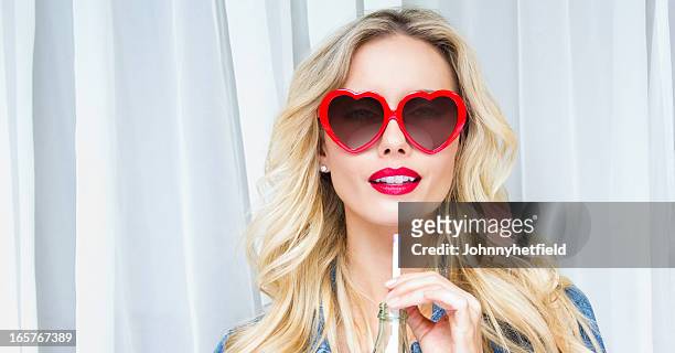 urban girl having soft drink - lipstick heart stock pictures, royalty-free photos & images